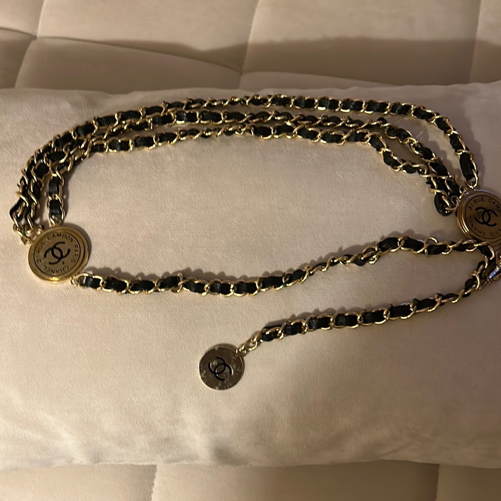 Chanel black and gold link belt.